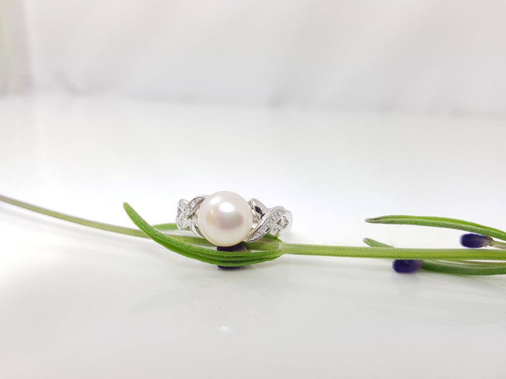 18k witgouden ring met echte parel en diamanten