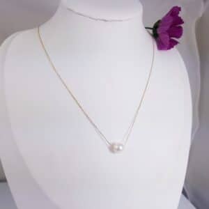 Geelgouden parelketting met parel