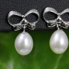 oorbellen zilver, strik modelletje met parel