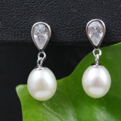 oorbellen met echte parels en zirconia stenen