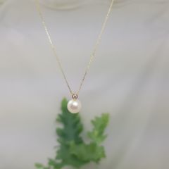 fijne geelgouden ketting met parel en diamant