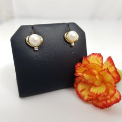 geelgouden parelknoppen met diamanten