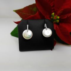 oorbellen in massief zilver met echte parel, plat van vorm