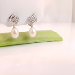 afhangende oorbelclips met echte parels
