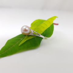 witgouden parelring met roze parel