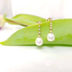gouden oorbellen met echte parels en diamanten