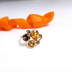 geelgouden ring met edelstenen